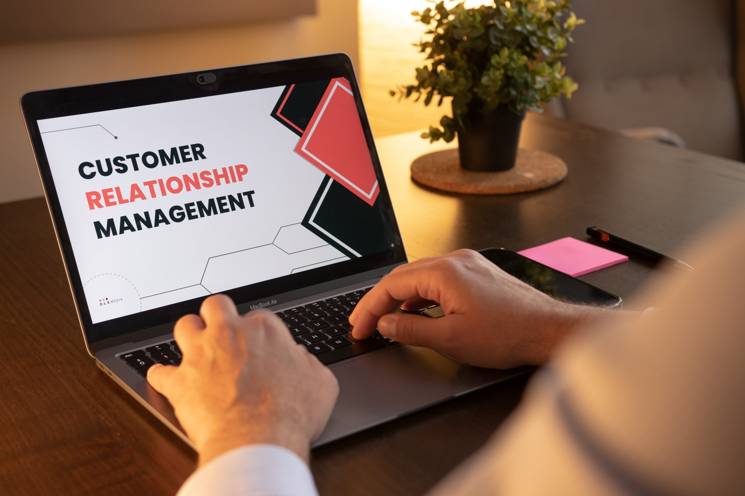 Customer relationship management on laptop screen